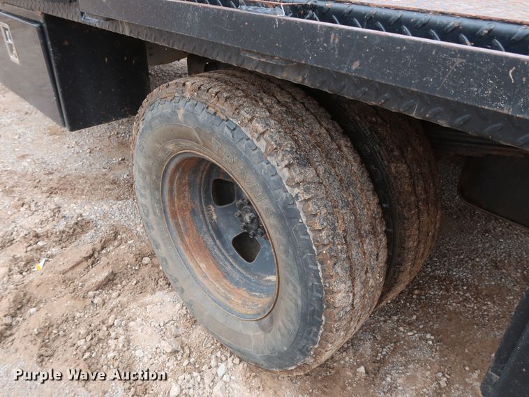 image for item DG7153 2013 Dodge Ram 3500HD  Crew Cab flatbed pickup truck