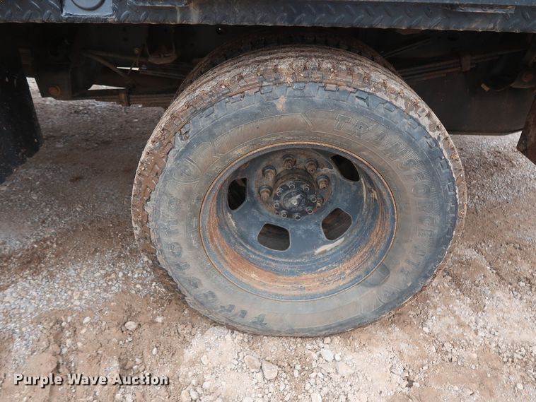 image for item DG7153 2013 Dodge Ram 3500HD  Crew Cab flatbed pickup truck