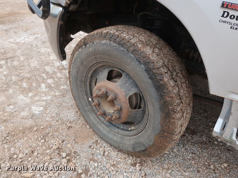 image for item DG7153 2013 Dodge Ram 3500HD  Crew Cab flatbed pickup truck