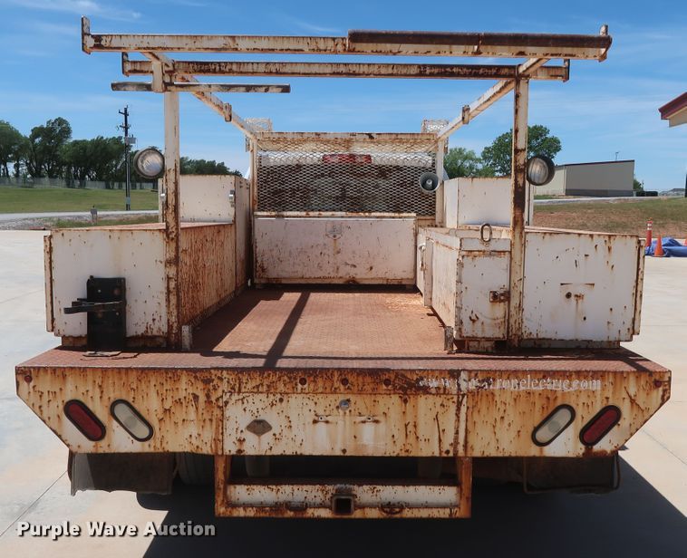 image for item DH0884 2012 Dodge Ram 3500HD  Crew Cab flatbed pickup truck