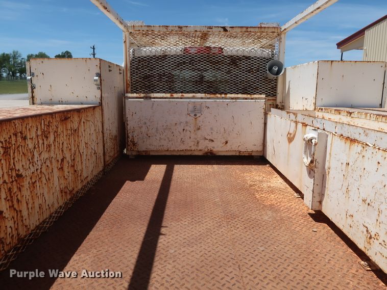 image for item DH0884 2012 Dodge Ram 3500HD  Crew Cab flatbed pickup truck