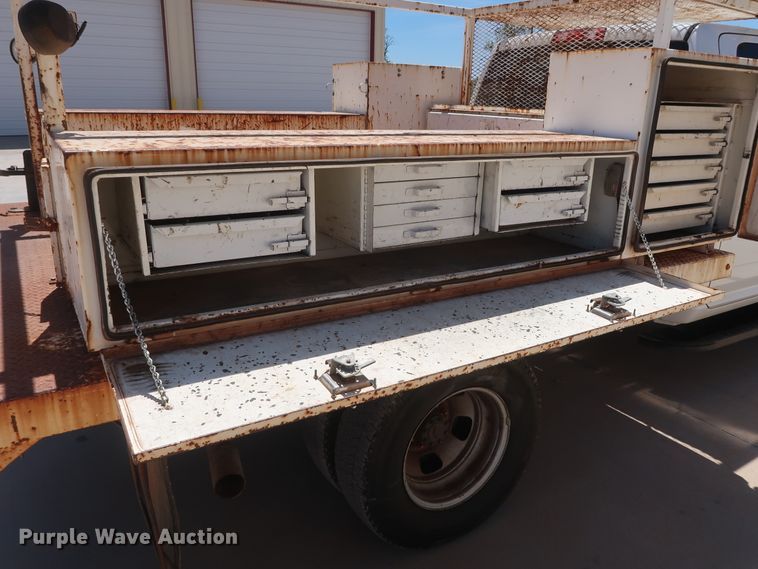 image for item DH0884 2012 Dodge Ram 3500HD  Crew Cab flatbed pickup truck