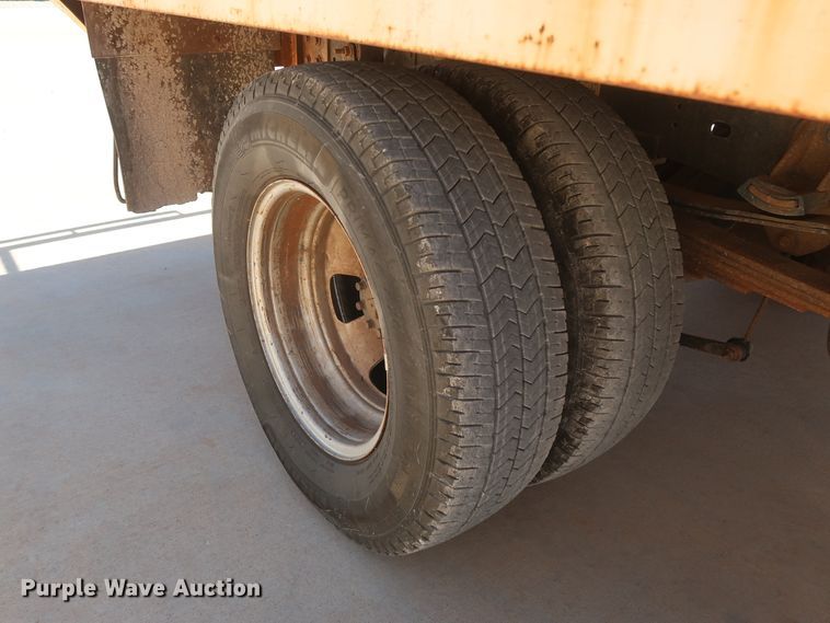 image for item DH0884 2012 Dodge Ram 3500HD  Crew Cab flatbed pickup truck