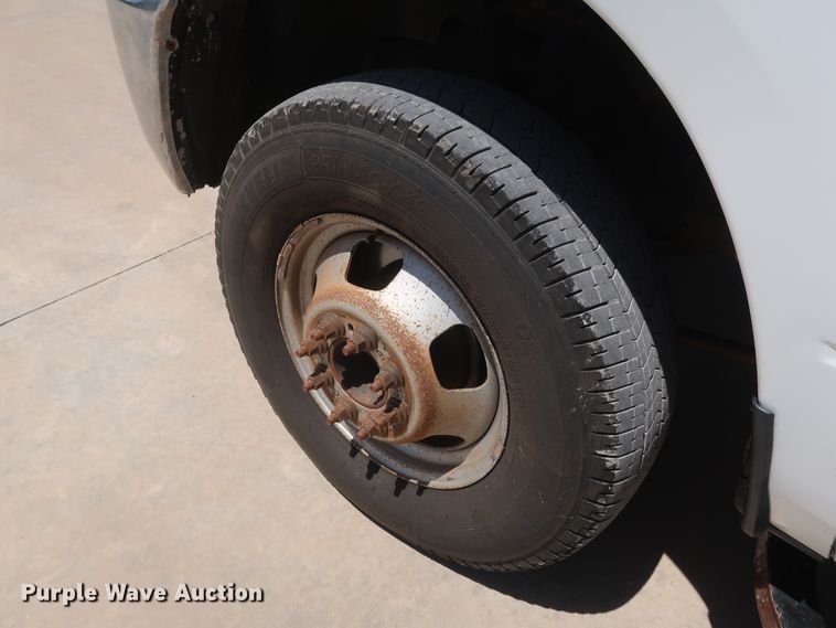 image for item DH0884 2012 Dodge Ram 3500HD  Crew Cab flatbed pickup truck