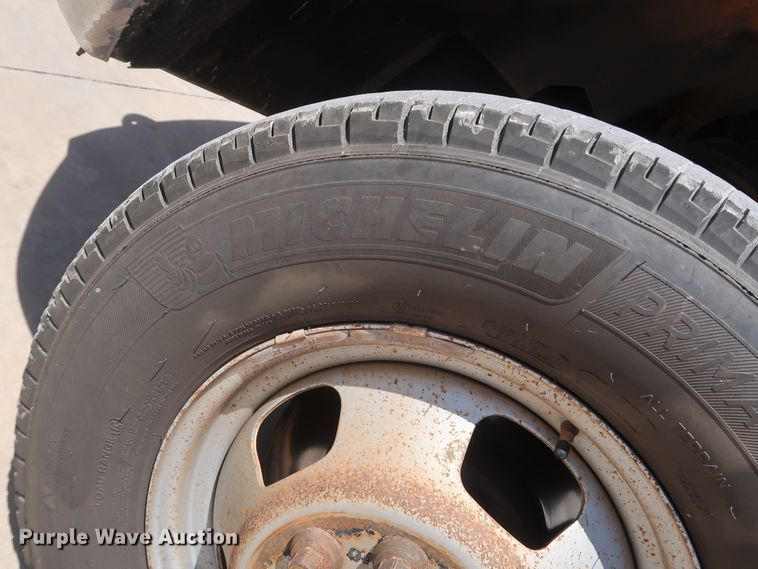 image for item DH0884 2012 Dodge Ram 3500HD  Crew Cab flatbed pickup truck