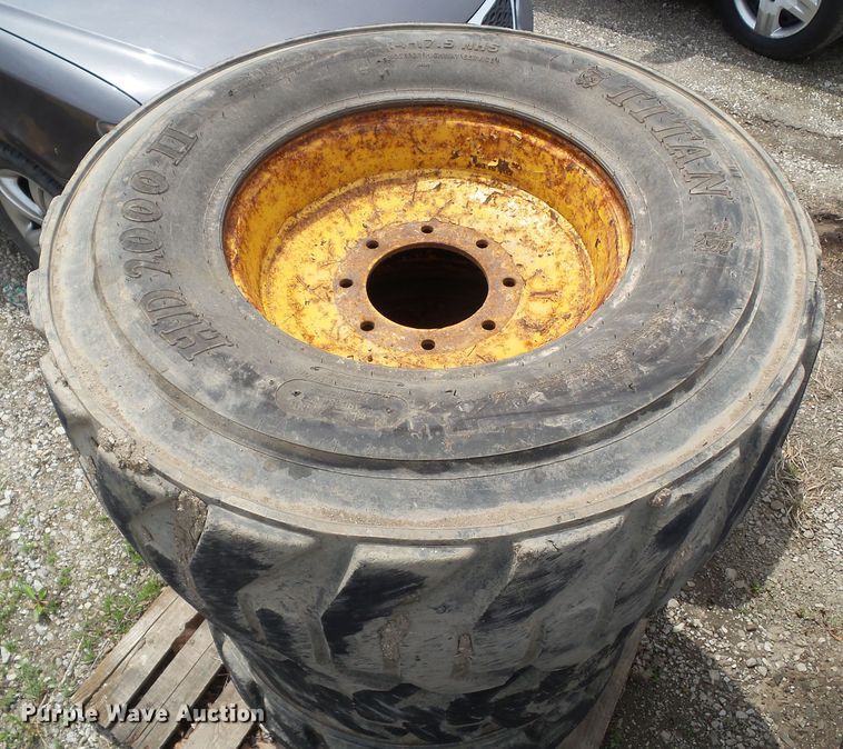 image for item EM9990 (4) Titan 14-17.5NHS tires and wheels