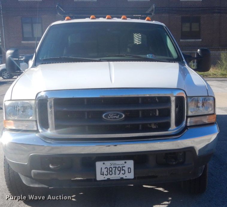 image for item GB9956 2002 Ford F350 Super Duty  Crew Cab utility bed pickup truck