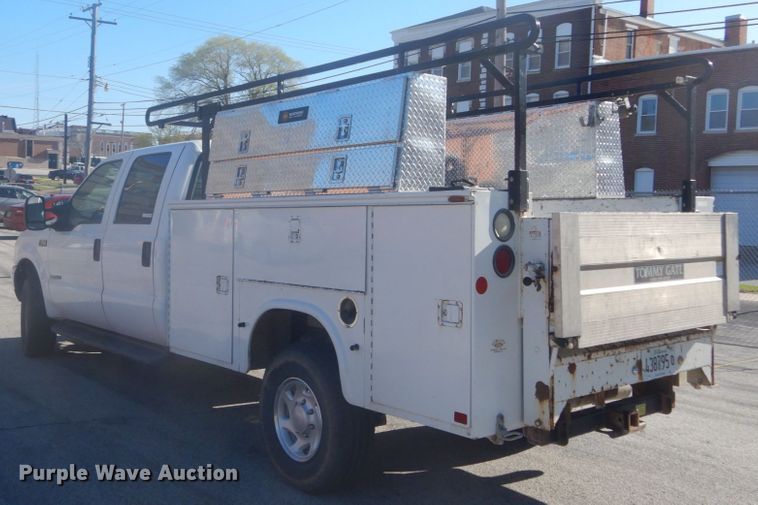 image for item GB9956 2002 Ford F350 Super Duty  Crew Cab utility bed pickup truck