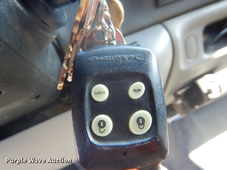 image for item GB9956 2002 Ford F350 Super Duty  Crew Cab utility bed pickup truck