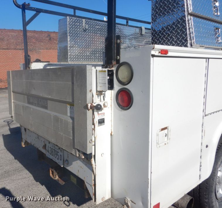 image for item GB9956 2002 Ford F350 Super Duty  Crew Cab utility bed pickup truck