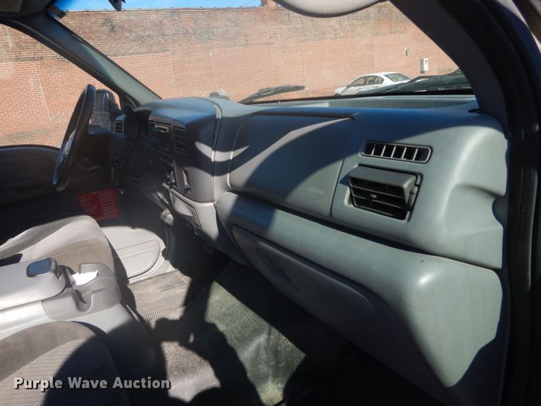 image for item GB9956 2002 Ford F350 Super Duty  Crew Cab utility bed pickup truck