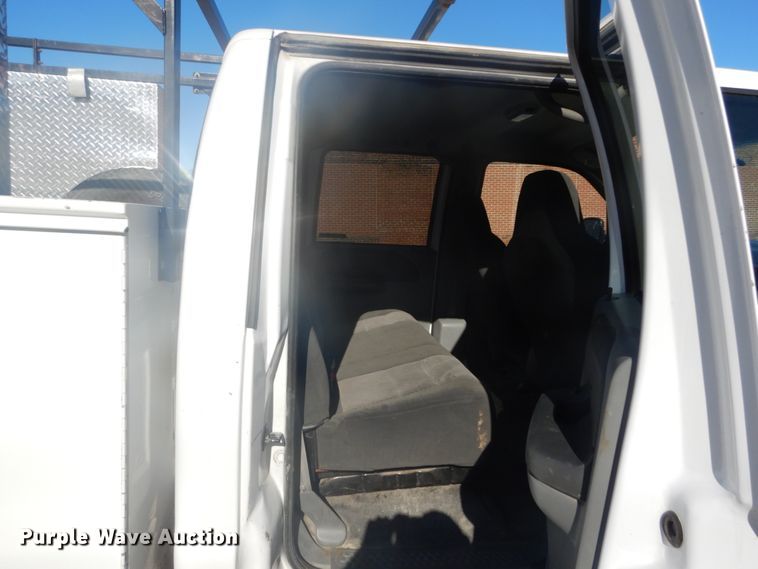 image for item GB9956 2002 Ford F350 Super Duty  Crew Cab utility bed pickup truck