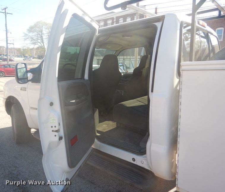 image for item GB9956 2002 Ford F350 Super Duty  Crew Cab utility bed pickup truck