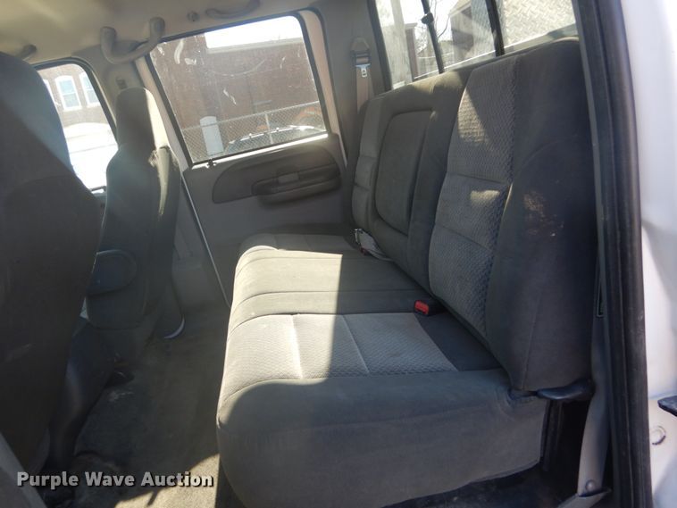 image for item GB9956 2002 Ford F350 Super Duty  Crew Cab utility bed pickup truck