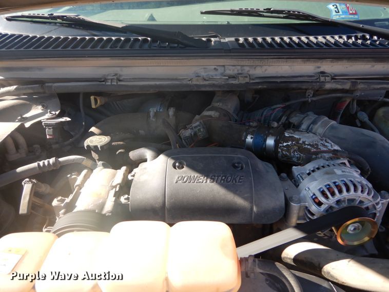 image for item GB9956 2002 Ford F350 Super Duty  Crew Cab utility bed pickup truck