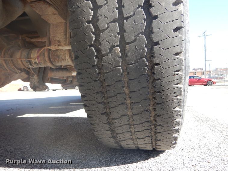 image for item GB9956 2002 Ford F350 Super Duty  Crew Cab utility bed pickup truck