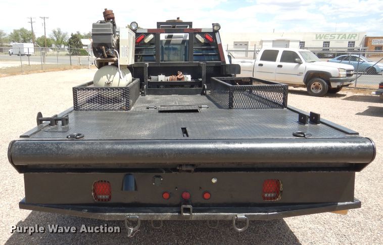image for item GE9382 2008 Ford F550 Super Duty Crew Cab flatbed truck