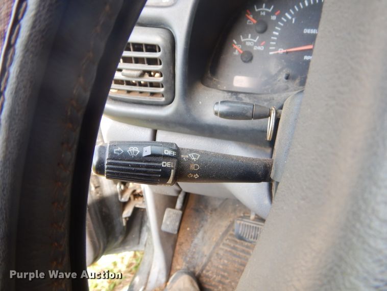 image for item GN9254 1999 Dodge Ram 3500 Laramie  flatbed pickup truck