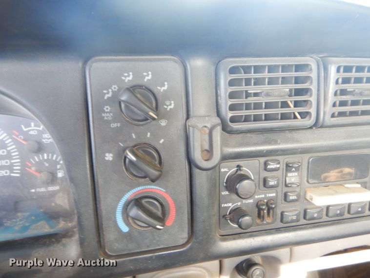 image for item GN9254 1999 Dodge Ram 3500 Laramie  flatbed pickup truck