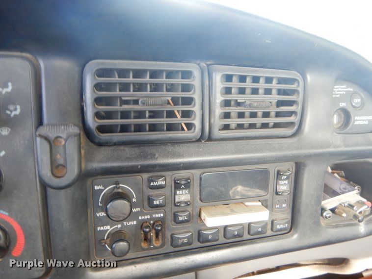 image for item GN9254 1999 Dodge Ram 3500 Laramie  flatbed pickup truck