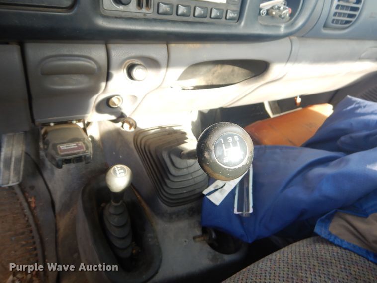 image for item GN9254 1999 Dodge Ram 3500 Laramie  flatbed pickup truck