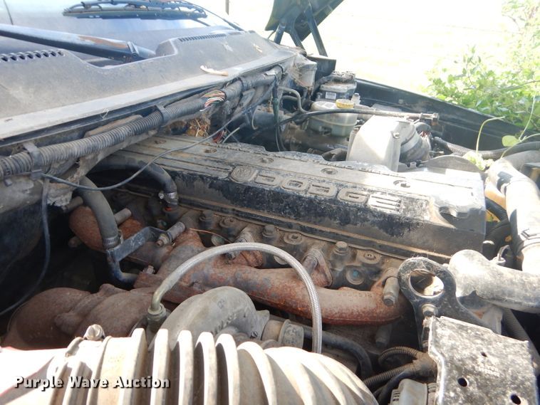 image for item GN9254 1999 Dodge Ram 3500 Laramie  flatbed pickup truck