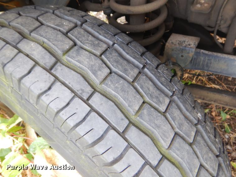 image for item GN9254 1999 Dodge Ram 3500 Laramie  flatbed pickup truck