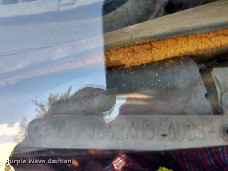 image for item GN9254 1999 Dodge Ram 3500 Laramie  flatbed pickup truck