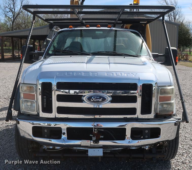 image for item GS9840 2008 Ford F550 Super Duty XLT flatbed truck with boom mower