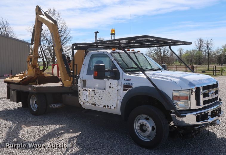 image for item GS9840 2008 Ford F550 Super Duty XLT flatbed truck with boom mower