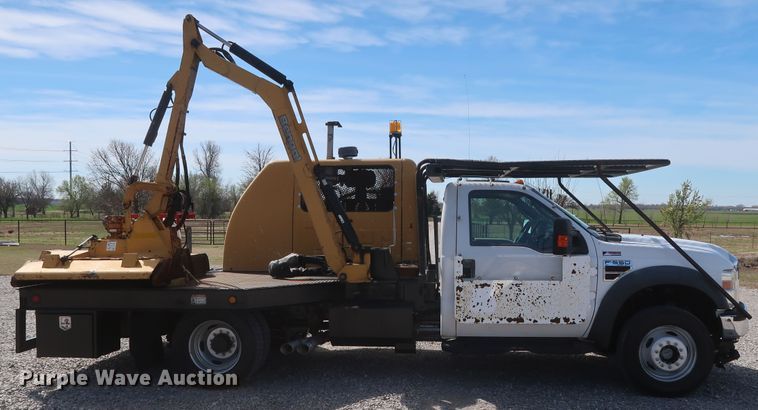 image for item GS9840 2008 Ford F550 Super Duty XLT flatbed truck with boom mower