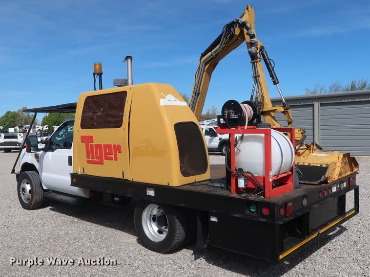 image for item GS9840 2008 Ford F550 Super Duty XLT flatbed truck with boom mower