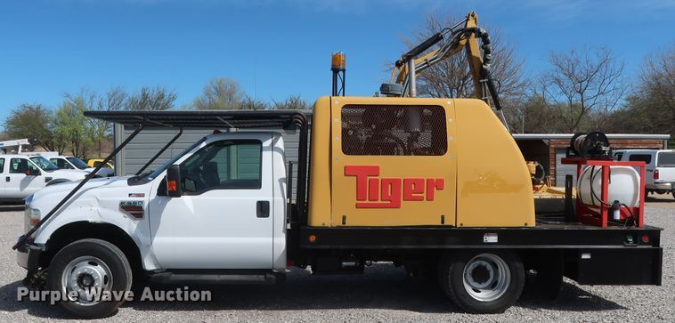 image for item GS9840 2008 Ford F550 Super Duty XLT flatbed truck with boom mower