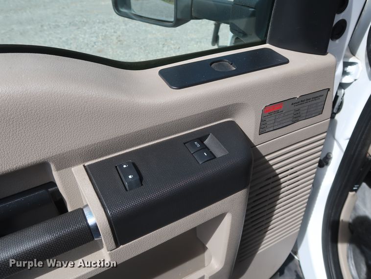 image for item GS9840 2008 Ford F550 Super Duty XLT flatbed truck with boom mower