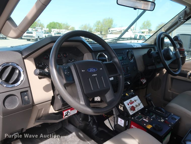 image for item GS9840 2008 Ford F550 Super Duty XLT flatbed truck with boom mower