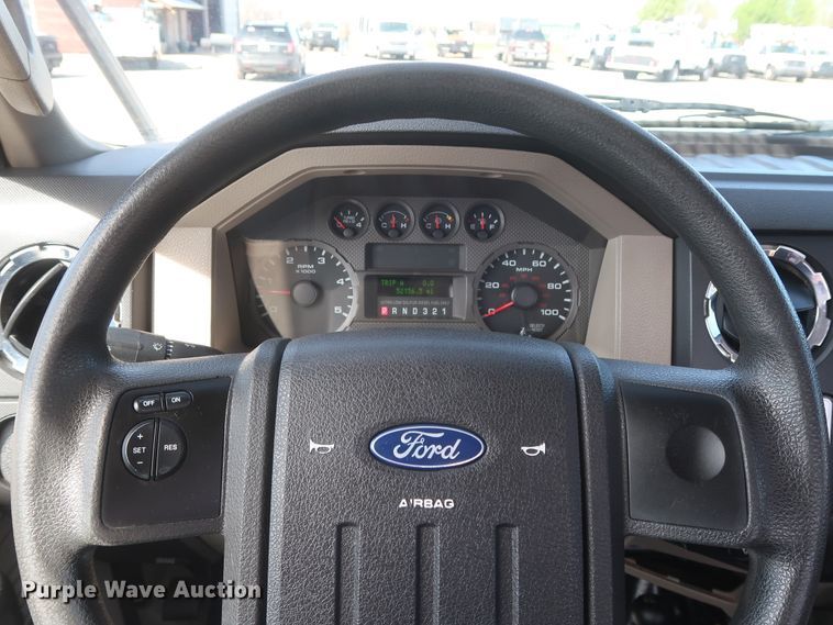 image for item GS9840 2008 Ford F550 Super Duty XLT flatbed truck with boom mower