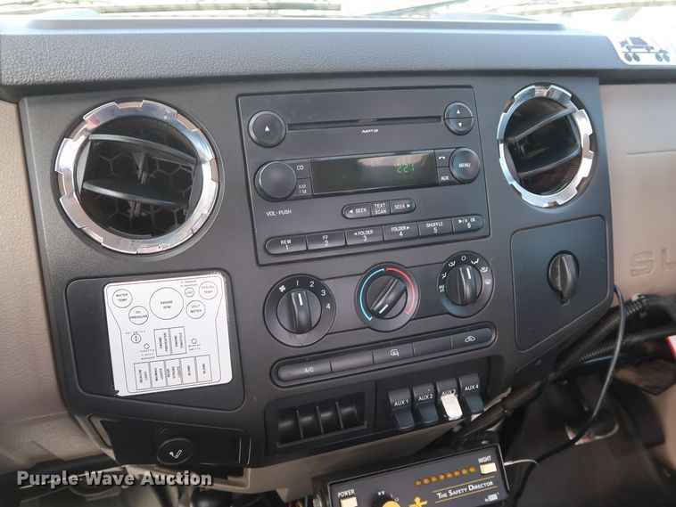 image for item GS9840 2008 Ford F550 Super Duty XLT flatbed truck with boom mower