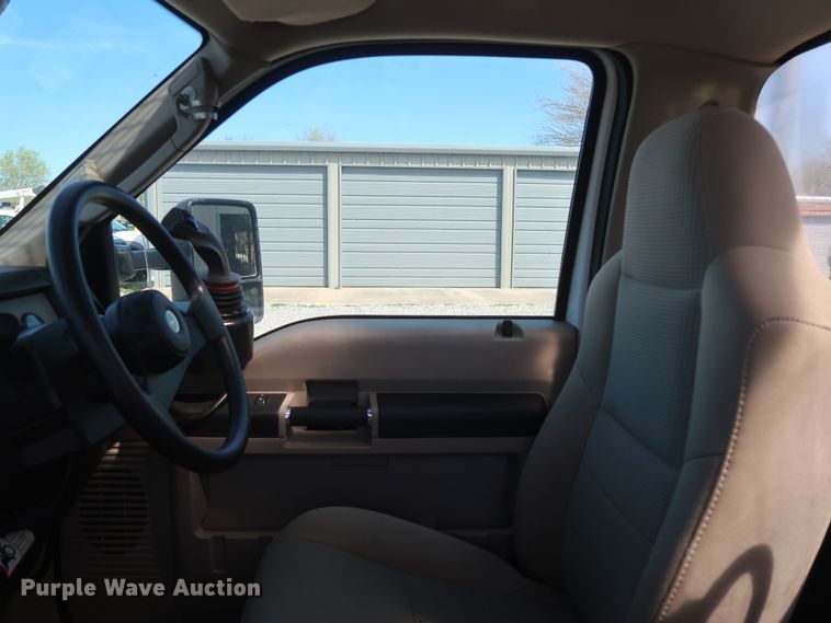 image for item GS9840 2008 Ford F550 Super Duty XLT flatbed truck with boom mower