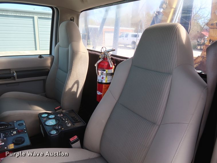 image for item GS9840 2008 Ford F550 Super Duty XLT flatbed truck with boom mower