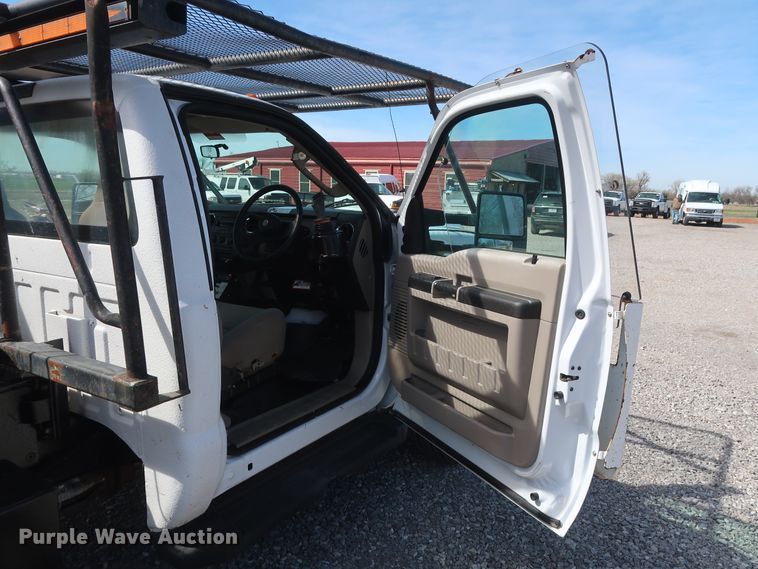 image for item GS9840 2008 Ford F550 Super Duty XLT flatbed truck with boom mower