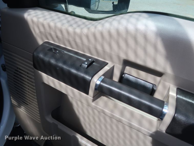 image for item GS9840 2008 Ford F550 Super Duty XLT flatbed truck with boom mower