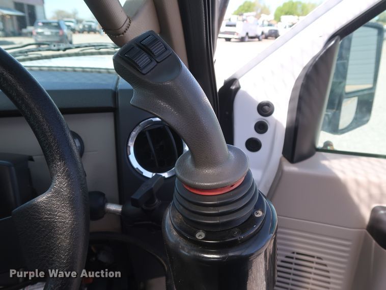 image for item GS9840 2008 Ford F550 Super Duty XLT flatbed truck with boom mower