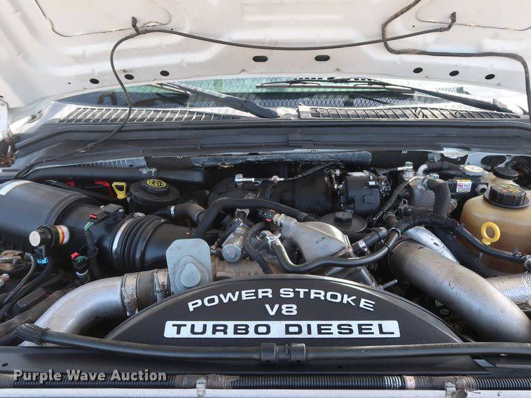 image for item GS9840 2008 Ford F550 Super Duty XLT flatbed truck with boom mower