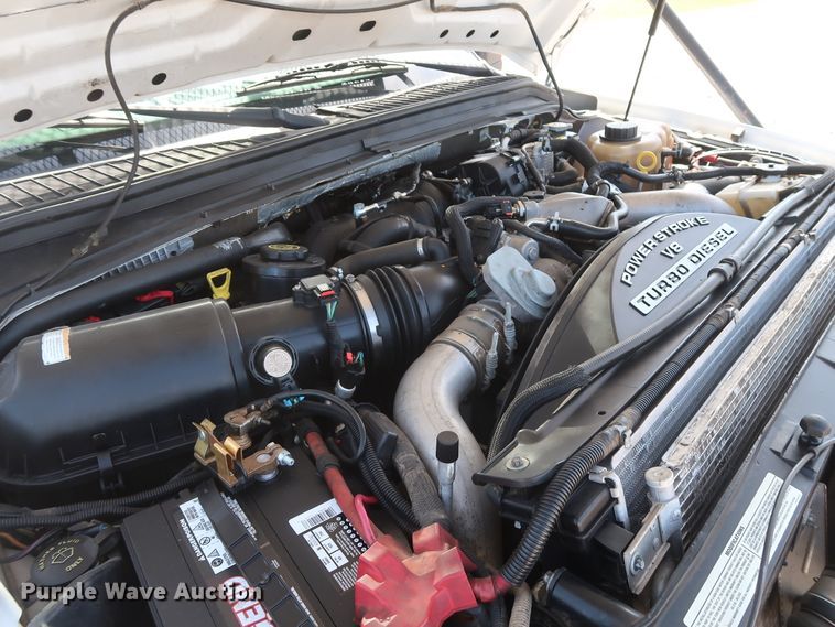 image for item GS9840 2008 Ford F550 Super Duty XLT flatbed truck with boom mower