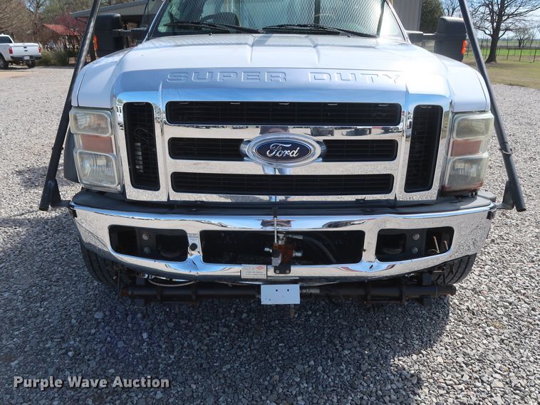 image for item GS9840 2008 Ford F550 Super Duty XLT flatbed truck with boom mower
