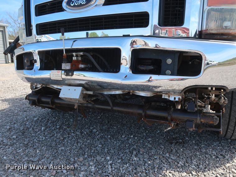 image for item GS9840 2008 Ford F550 Super Duty XLT flatbed truck with boom mower