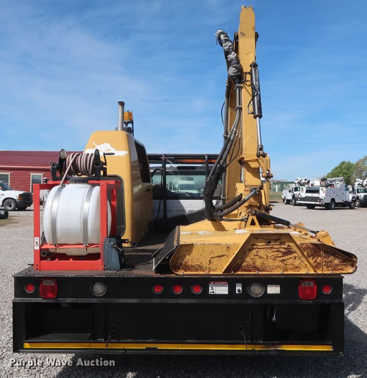 image for item GS9840 2008 Ford F550 Super Duty XLT flatbed truck with boom mower