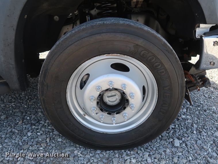 image for item GS9840 2008 Ford F550 Super Duty XLT flatbed truck with boom mower