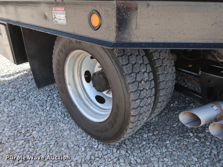 image for item GS9840 2008 Ford F550 Super Duty XLT flatbed truck with boom mower