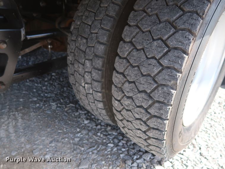 image for item GS9840 2008 Ford F550 Super Duty XLT flatbed truck with boom mower